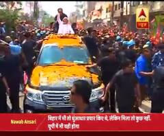 Large crowds throng Varanasi as narendramodi arrives for road show in Varanasi