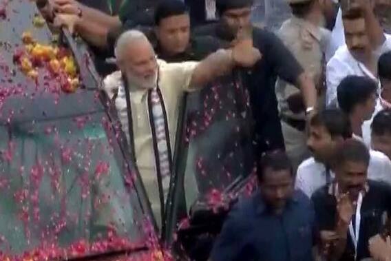 Watch PM Modi and CM Rupani wave at people in Rajkot
