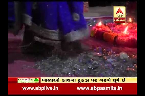 girls perform garba on pieces of glass in junagadh