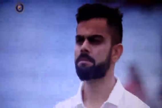virat kohli chews gum during national anthem before kolkata test