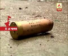 আমডাঙার রাস্তার দুপাশে পড়ে রয়েছে একাধিক বোমা, গুলির খোল, দেখুন সেই ছবি