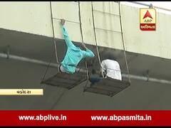 વડોદરાઃ બ્રિજ નીચે લટકીને કારીગર જીવના જોખમે કરી રહ્યા છે કામ, જુઓ વીડિયો