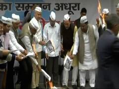 AAP leaders including CM Kejriwal burn BJP's manifesto 