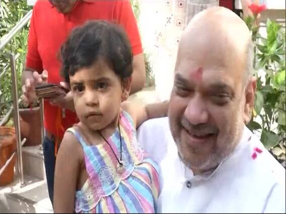 Amit Shah meets BJP workers in Ahmadabad ahead of his road show