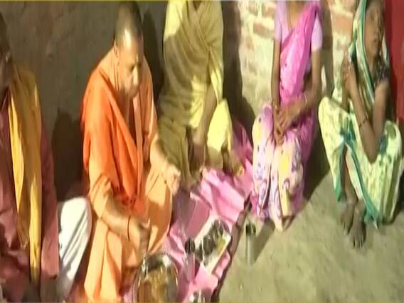 Amid poll panel's gag order, CM Yogi visits house of beneficiary of PMAY