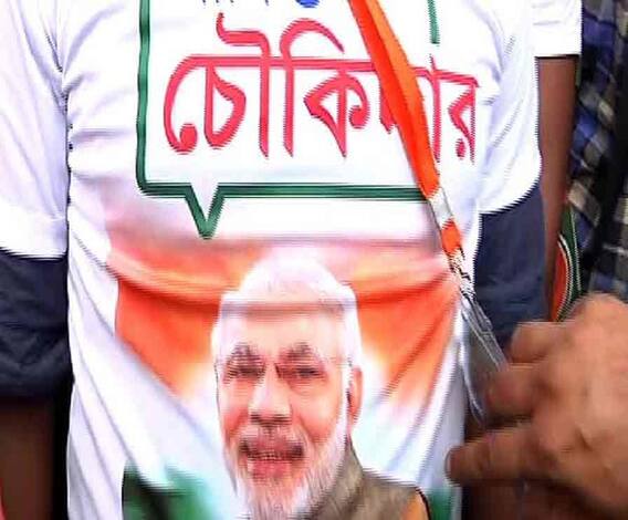 মোদির ব্রিগেড-সভায় বিজেপির স্বেচ্ছাসেবকদের জন্য বিশেষ গেঞ্জির ব্যবস্থা, টি-শার্টের পিছনে লেখা কেন্দ্রে আবার মোদি সরকার, বুকে লেখা আমিও চৌকিদার