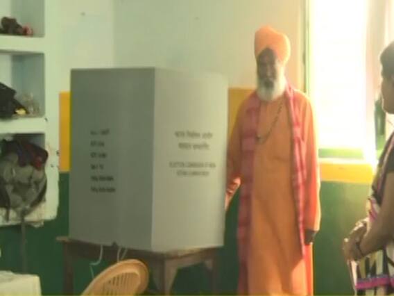 Visuals of Sakshi Maharaj voting inside a poll booth 