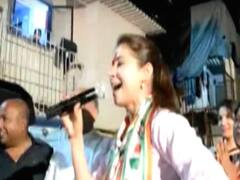 Congress' North Mumbai contestant Urmila Matondkar sings during campaigning 