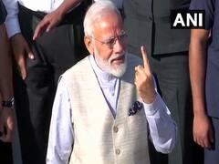 અમદાવાદઃ પીએમ મોદીએ કર્યુ મતદાન, અમિત શાહ રહ્યા હાજર, જુઓ વીડિયો 