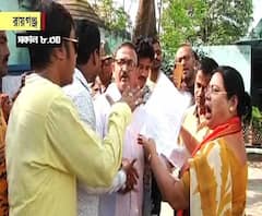 রায়গঞ্জ করোনেশন স্কুলে বিজেপি এজেন্টকে বসতে বাধা দেওয়ার অভিযোগ, বিজেপি প্রার্থী দেবশ্রী চৌধুরী ঘটনাস্থলে গেলে তাঁকে ঘিরে বিক্ষোভ তৃণমূলের