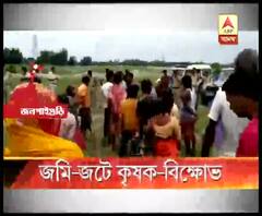 জলপাইগুড়ির গজলডোবায় অধিগৃহীত জমিতে সরকারি প্রকল্পের সাইনবোর্ড লাগাতে গিয়ে বিক্ষোভের মুখে প্রশাসনিক আধিকারিকরা