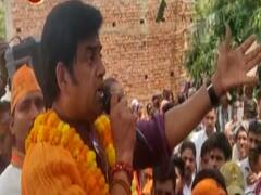 Ravi Kishan dances with BJP supporters while poll campaigning in Gorakhpur 