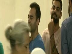 Team India captain Virat Kohli reaches polling booth in Gurugram to cast his vote