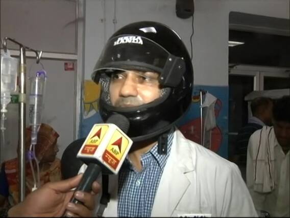 Kanpur doctors protest by wearing helmets