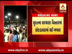 સુરતના ડાયરામાં બબાલ, પોતાના મનપસંદ ગીતો ગવડાવવાને લઇને લોકોએ રૂપિયાની સાથે તકિયા ઉછાળ્યા, જુઓ વીડિયો 