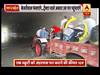 प्रह्लादपुर अंडरपास में भरा पानी, 10 रुपये देकर लोगों ने ट्रैक्टर से पार किया रास्ता