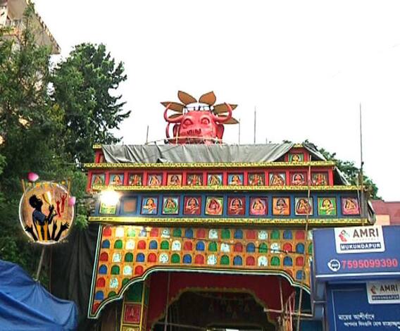 পটশিল্পকে একটু নতুন আঙ্গিকে ব্যবহার করে সেজে উঠছে সিংহিপার্ক সর্বজনীনের মণ্ডপ